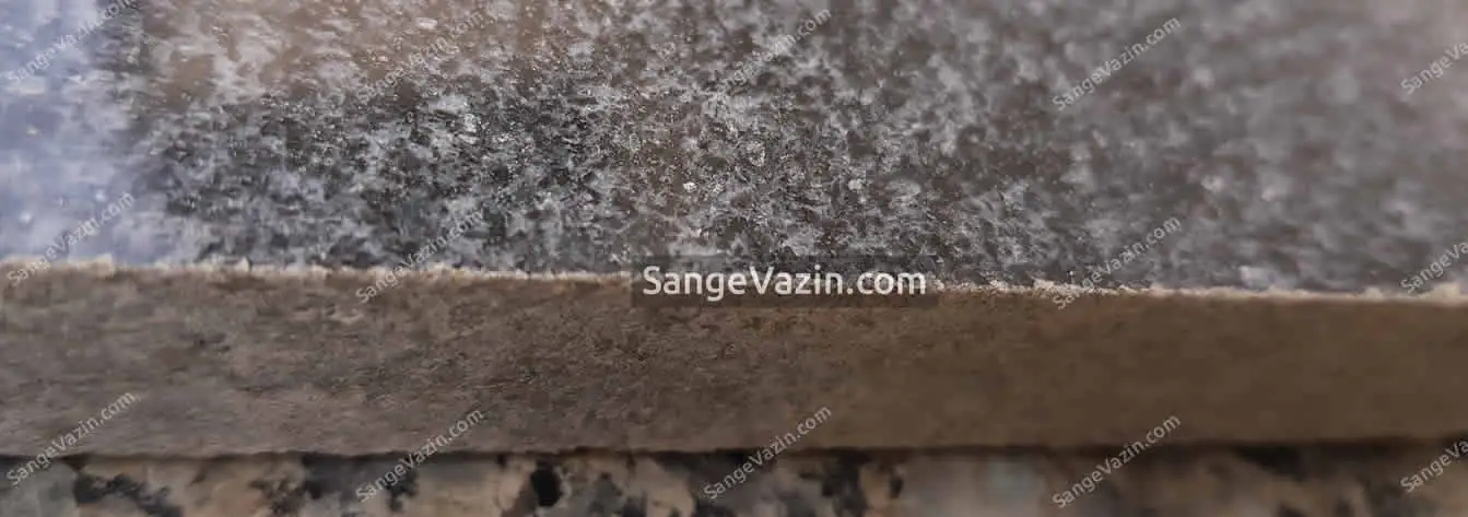 Natanz black granite texture