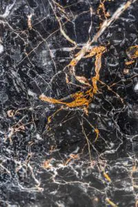 golden black marble - gold pattern vein in stone picture