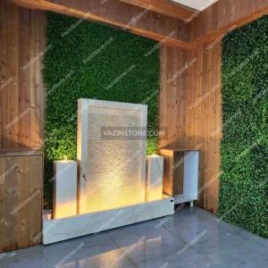 Mandana stone fountain with green wall