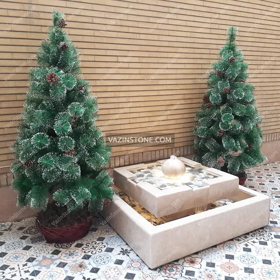 Chalipa stone fountain in a yard