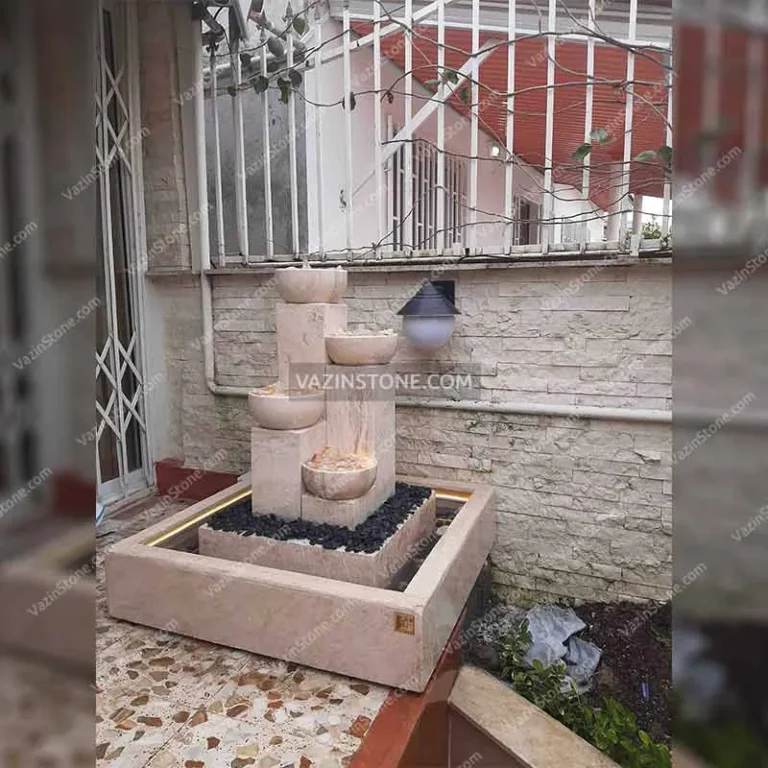 Arshia stone fountain in a yard