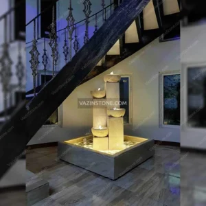 Arshia stone fountain in a lobby