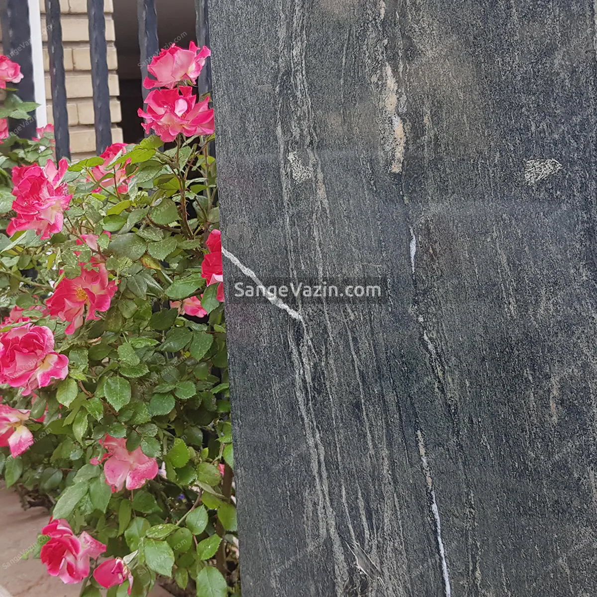Forest green granite outdoor wall