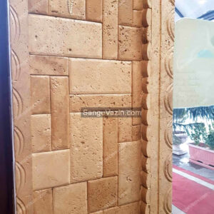 cream stacked stone on columns
