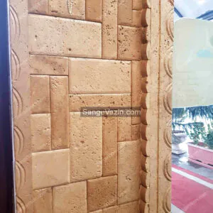 cream stacked stone on columns