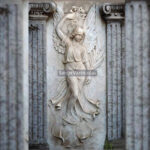Stone angel statue on the facade