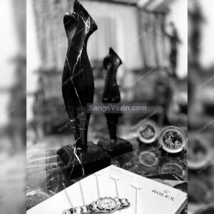 black lady stone sculpture