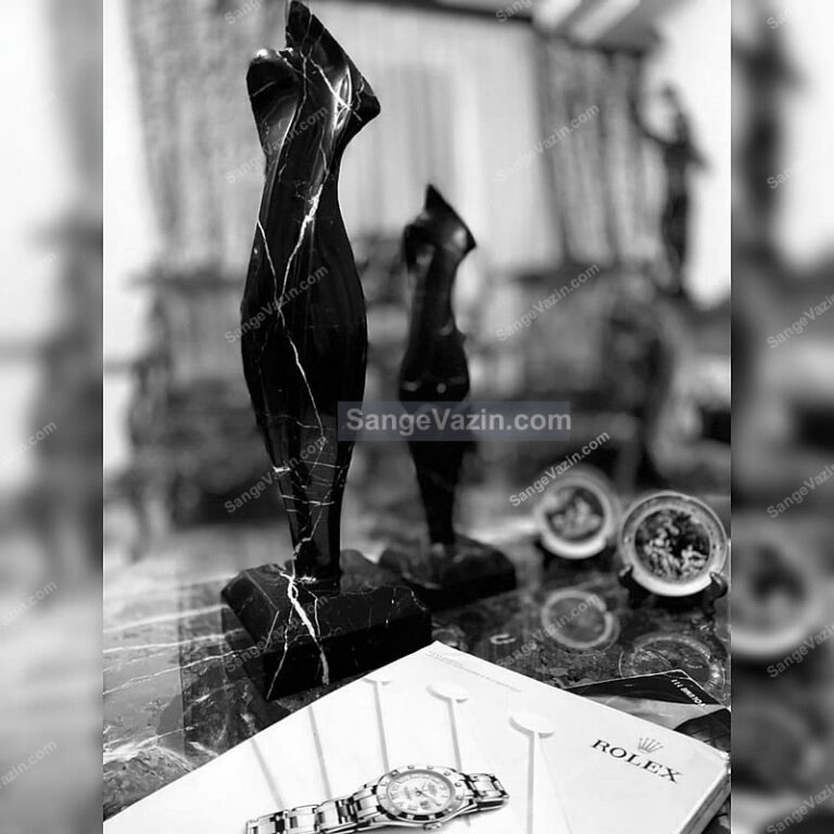 black lady stone sculpture