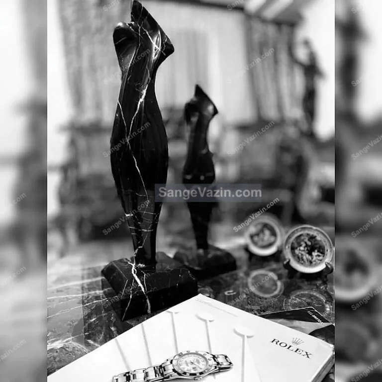 black lady stone sculpture