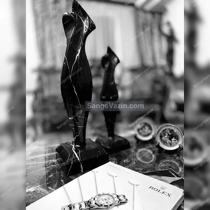 black lady stone sculpture
