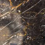 golden black marble stone slab closeup