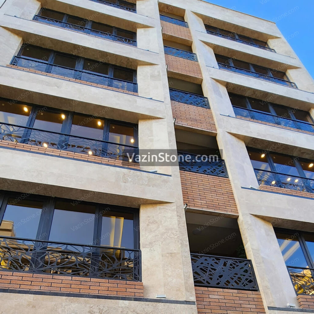 brick and travertine stone on facade
