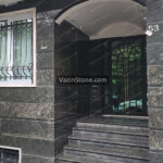 green granite on facade wall