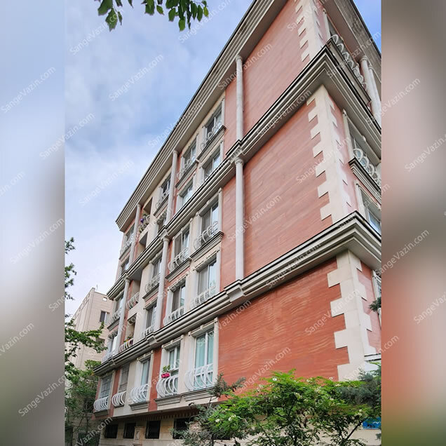 Red travertine stone on facade