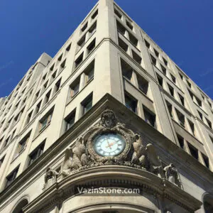 clock and classic roman facade