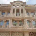 cream travertine on facade