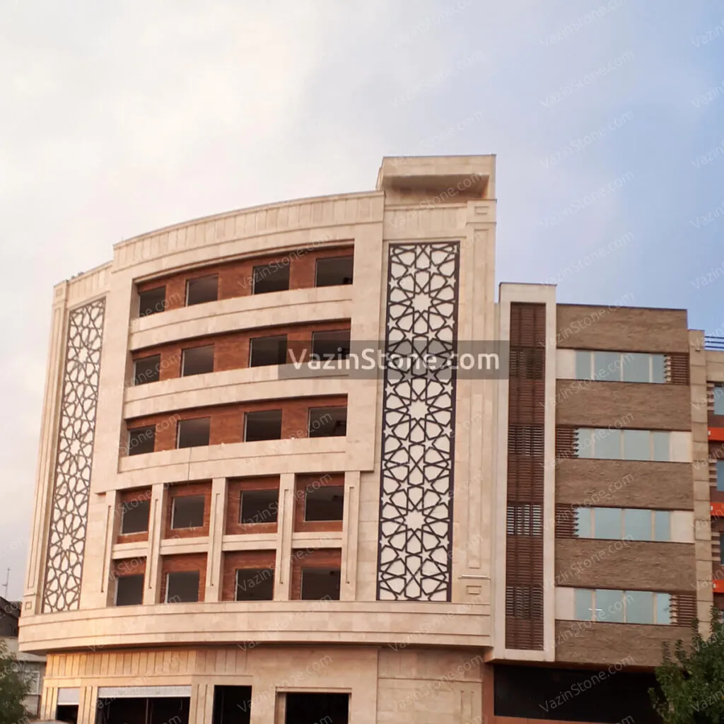 Darre Bokhari travertine combine white brick on facade