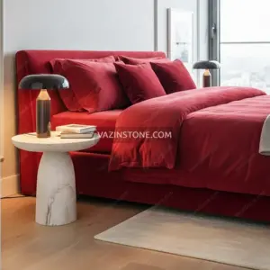 Alish side table next to a bed