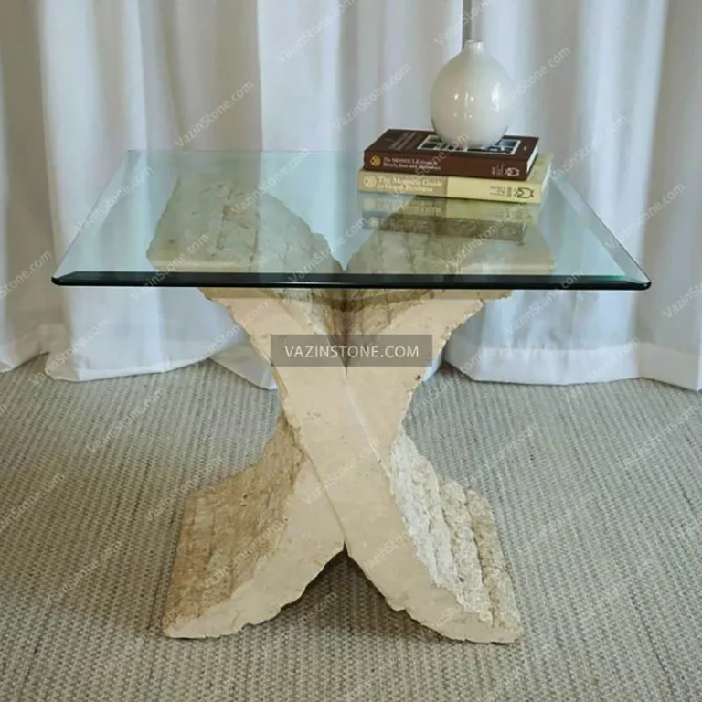 X-shaped coffee table with decorative items