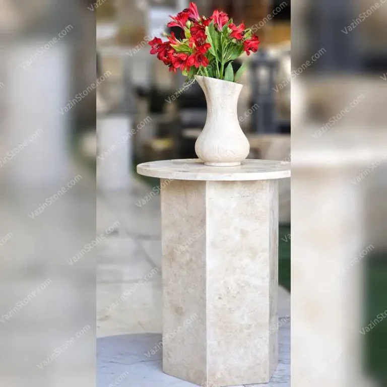 Wheat stone flower pot on the Helma stone coffee table
