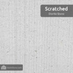 Scratched diorite stone