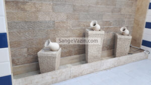 The combination of jug fountain and inscription fountain