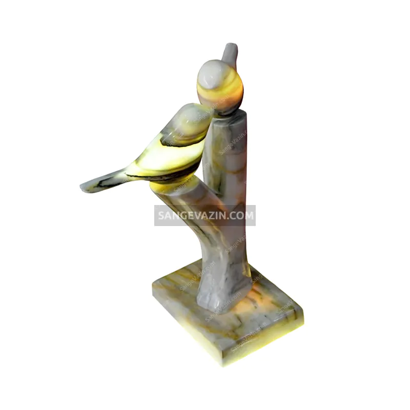 Tree and sparrow stone sculpture