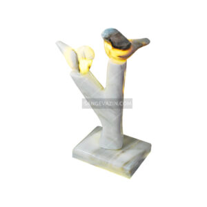 Tree and sparrow stone sculpture