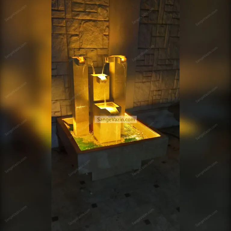 Vista stone fountain at night