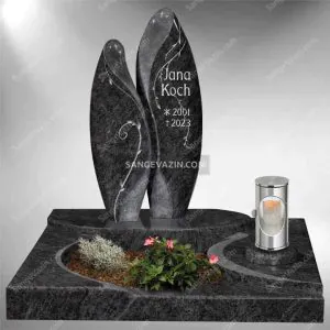 A pair of tombstone next to each other