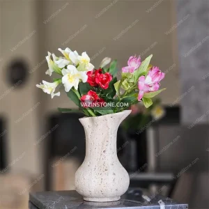 Wheat stone flower pot with flowers