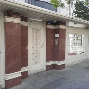 Red granite stone on facade