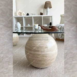 Stone sphere-shaped base of Setia stone coffee table