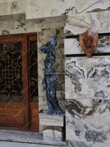 Building entrance with stone sculpture