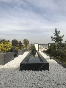 Rectangular stone fountain on roof garden