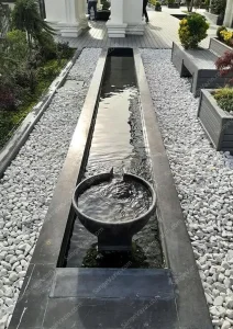 Rectangular stone fountain on roof garden