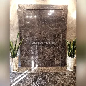 Dark emperador slab on lobby wall