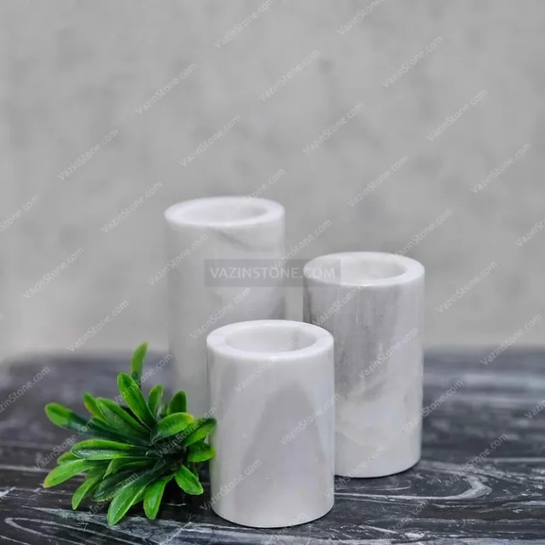 Vina stone candlestick on the stone table