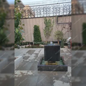 Suspended cubic stone fountain in the villa
