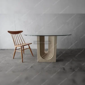 Vasta stone dining table with a chair picture