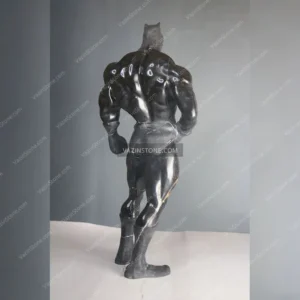 Batman stone sculpture from back