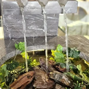 Elsan stone fountain closeup