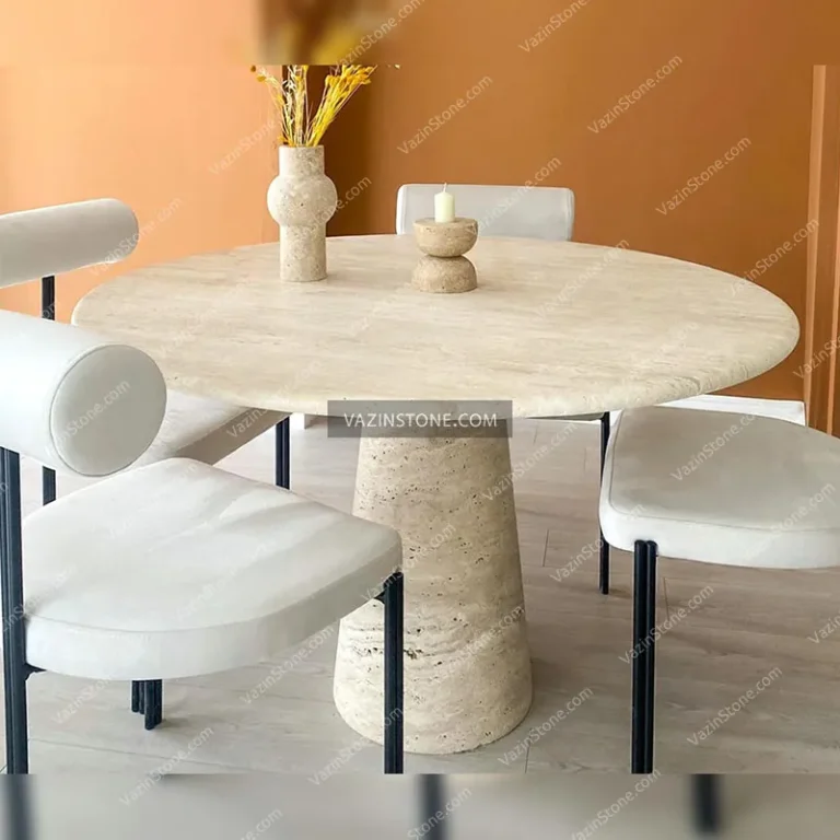 Shilan stone dining table with chairs.