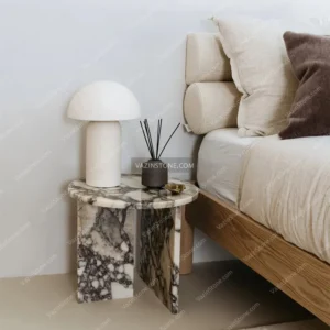 Atrisa stone side table in bedroom