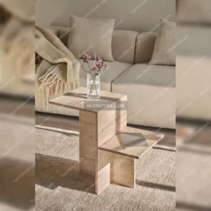 Trima stone side table in a living room