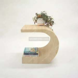 Cylora stone side table with decorative items
