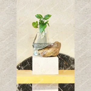 Photo of the glass and stone flower pot