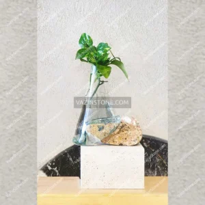 Photo of the glass and stone flower pot