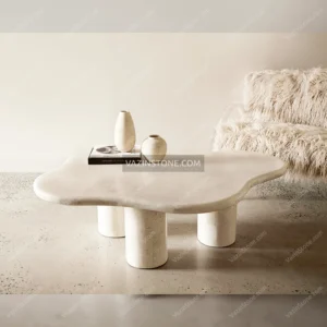 Ayla stone coffee table with decorative items