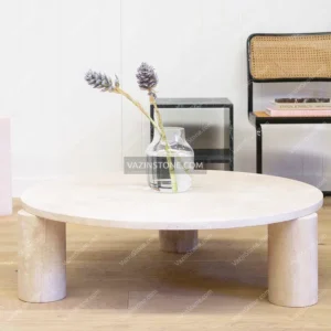 Milo stone coffee table with a glass flower pot
